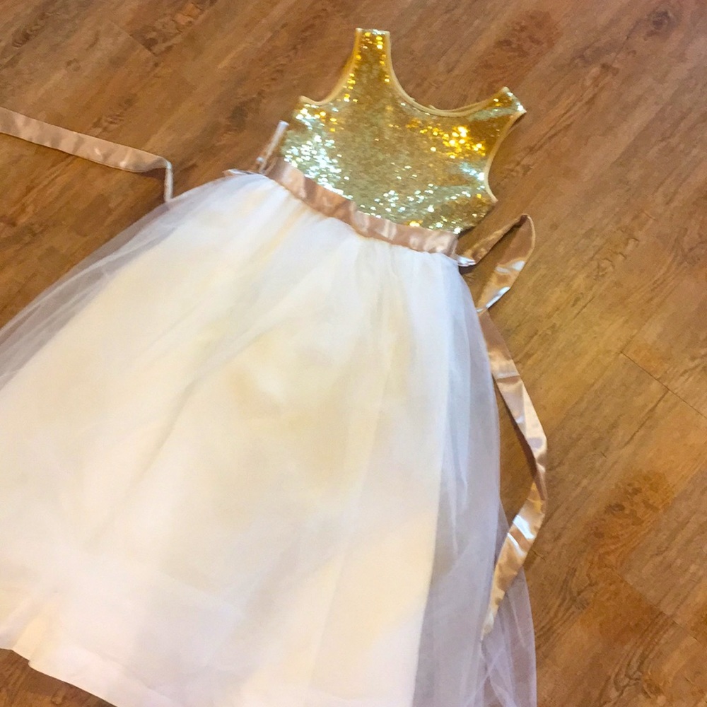 Floor length Tule and sequin gown for girls.